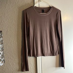 Large brown long sleeve shirt.